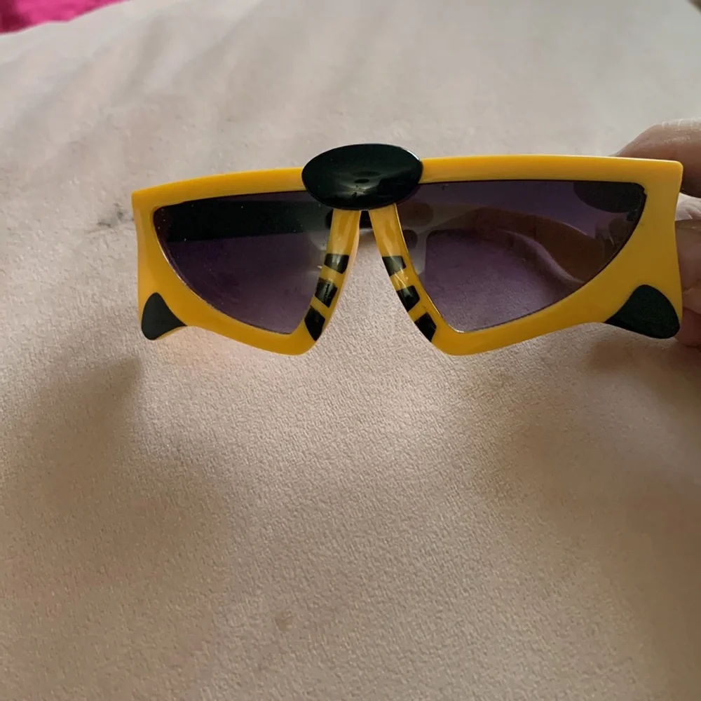 Kids Raccoon sun glasses. Free with any kid/ Toddler purchase.